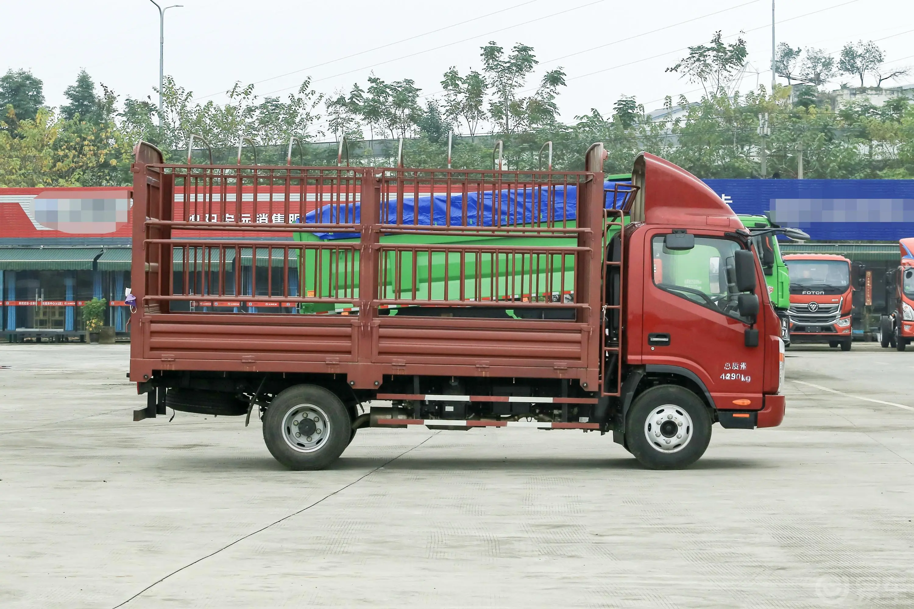 帅铃Q6Q6 安康2.7L 152马力 3308轴距 4X2排半仓栅式轻卡 国Ⅴ正侧车头向右水平